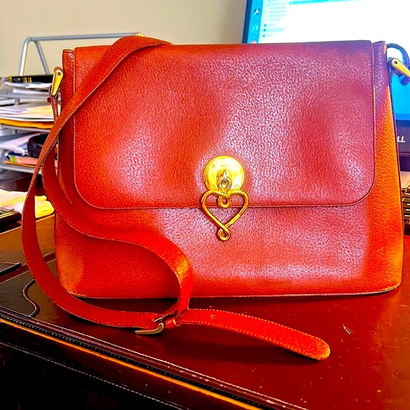 Authentic Vintage Moschino leather bag cross body or shoulder . Great condition